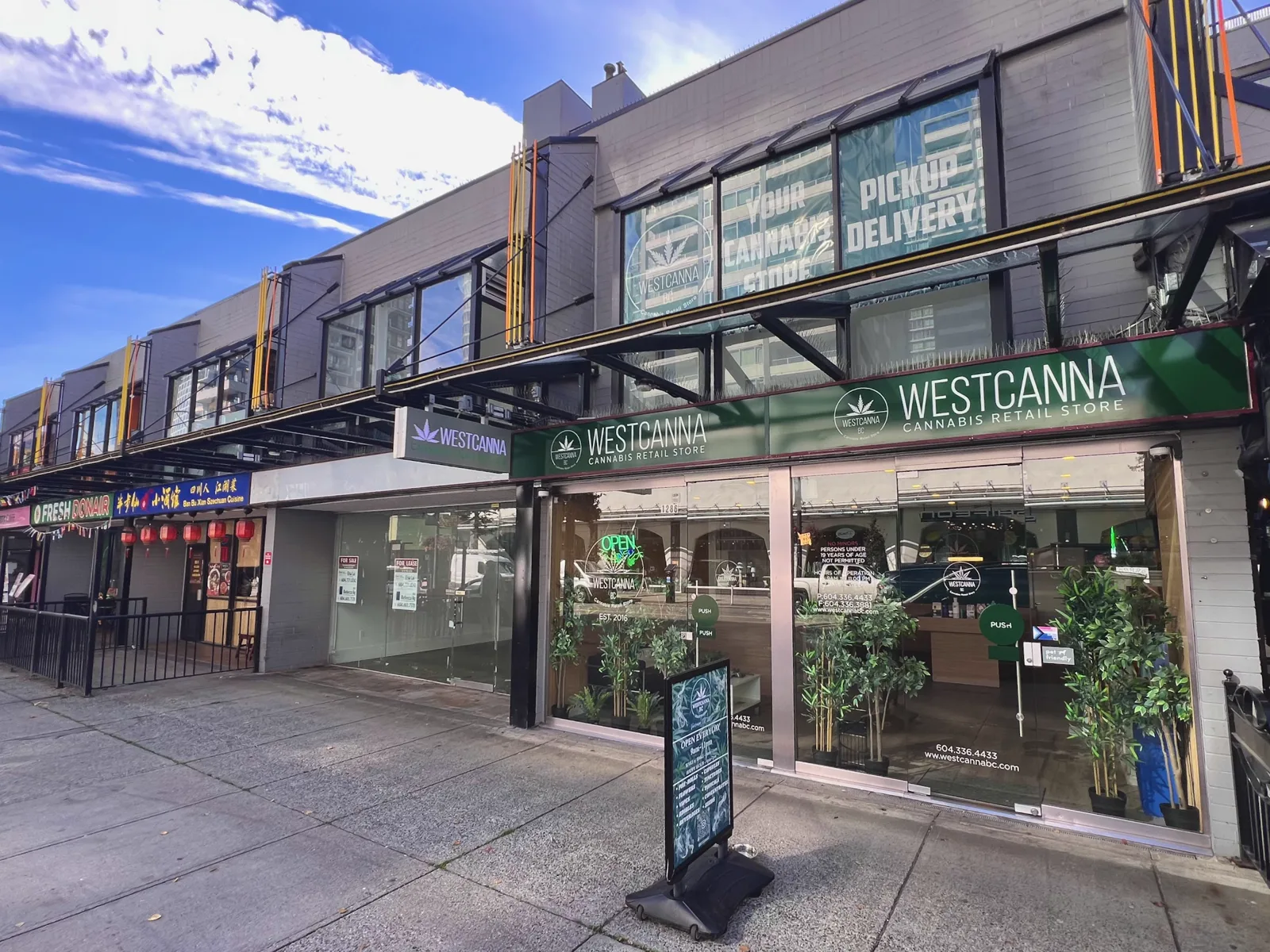 WestCanna BC on Robson Street: the green WESTCANNA sign, the OPEN sign and glass doors at number 1286.