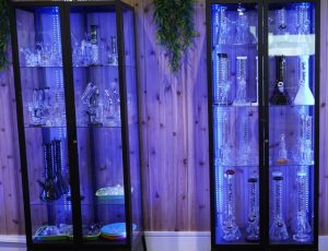 cannabis bongs in a display case